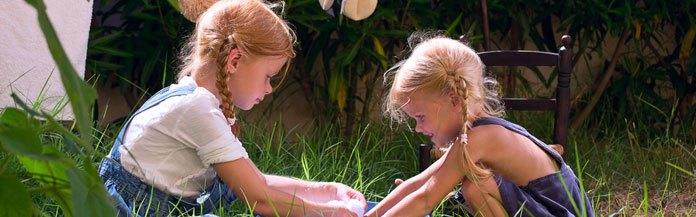 two-girls-washing-clothes