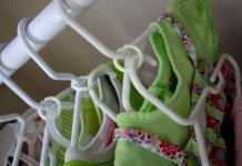 Hangers are one of those often-overlooked necessities and hangers sized for babies' and children's clothes can make organizing a lot easier. 