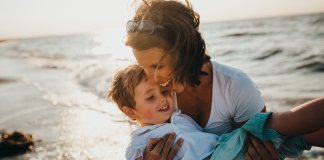 mom holding a child