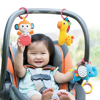 Infantino Tag Along Travel car seat toy front view