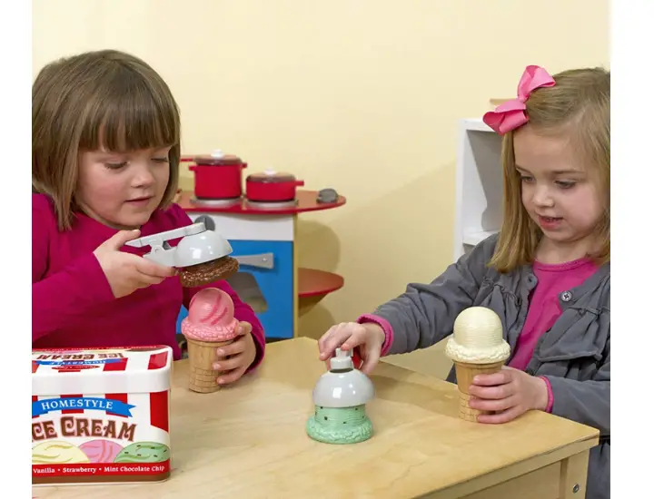 The Melissa & Doug Scoop & Stack Ice Cream Play Set incourages social interaction.