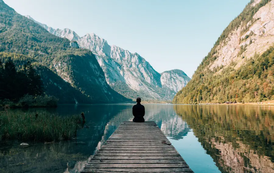 sitting near lake