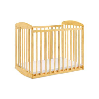 davinci alpha mini rocking natural portable cribs right side